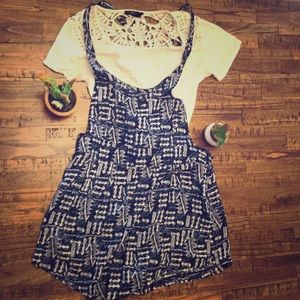 Blue and white patterned romper
